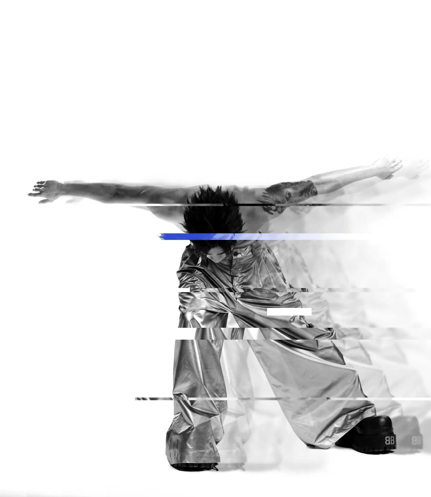 A figure bent forward with arms out wide, in black and white, with trailing copies and displaced strips